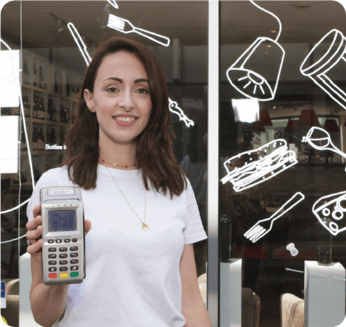 Woman holding Handepay Card Payment Machine