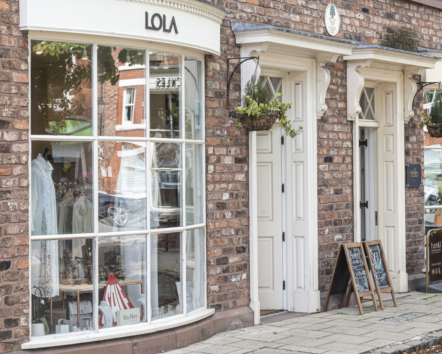 Lola business owner with card machine