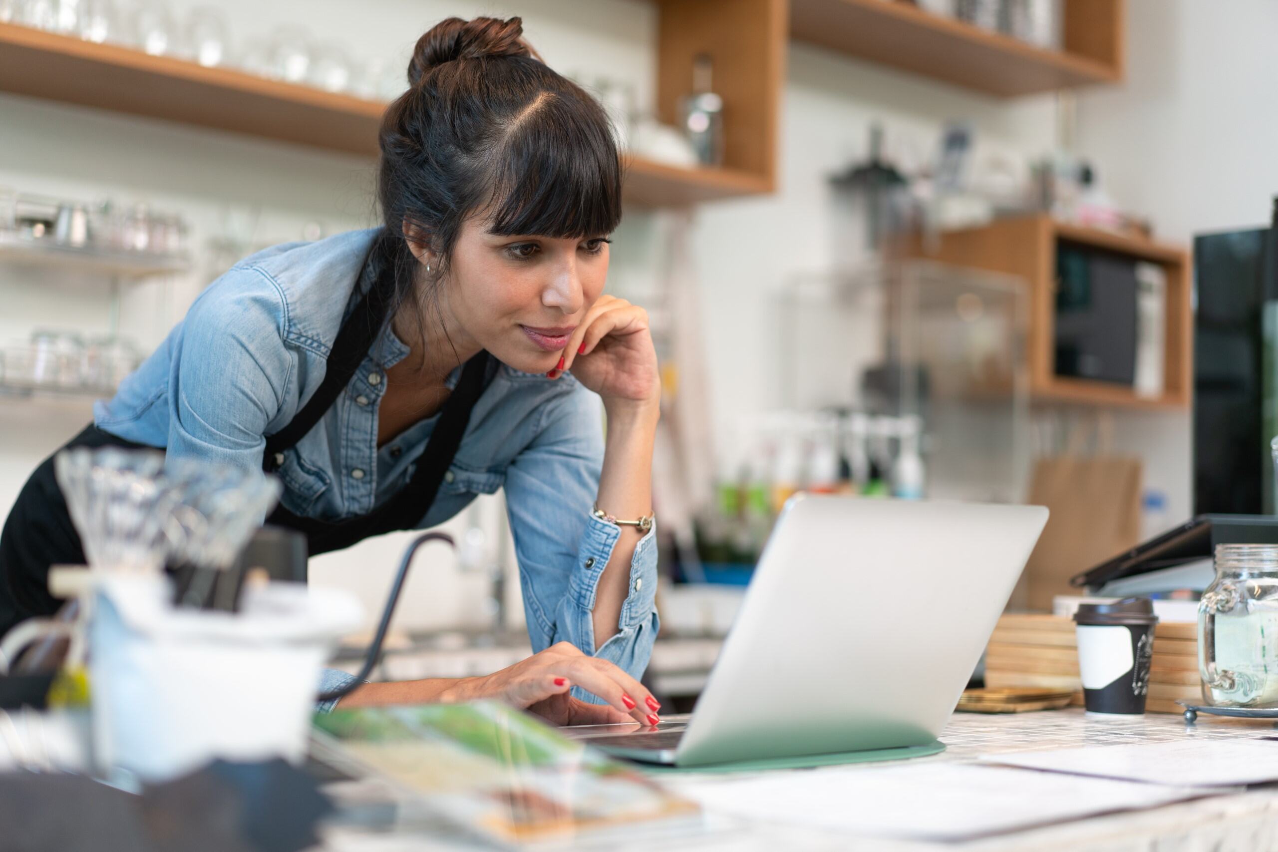 Business owner using laptop