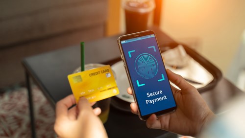 Secure phone payment taking place using biometric security