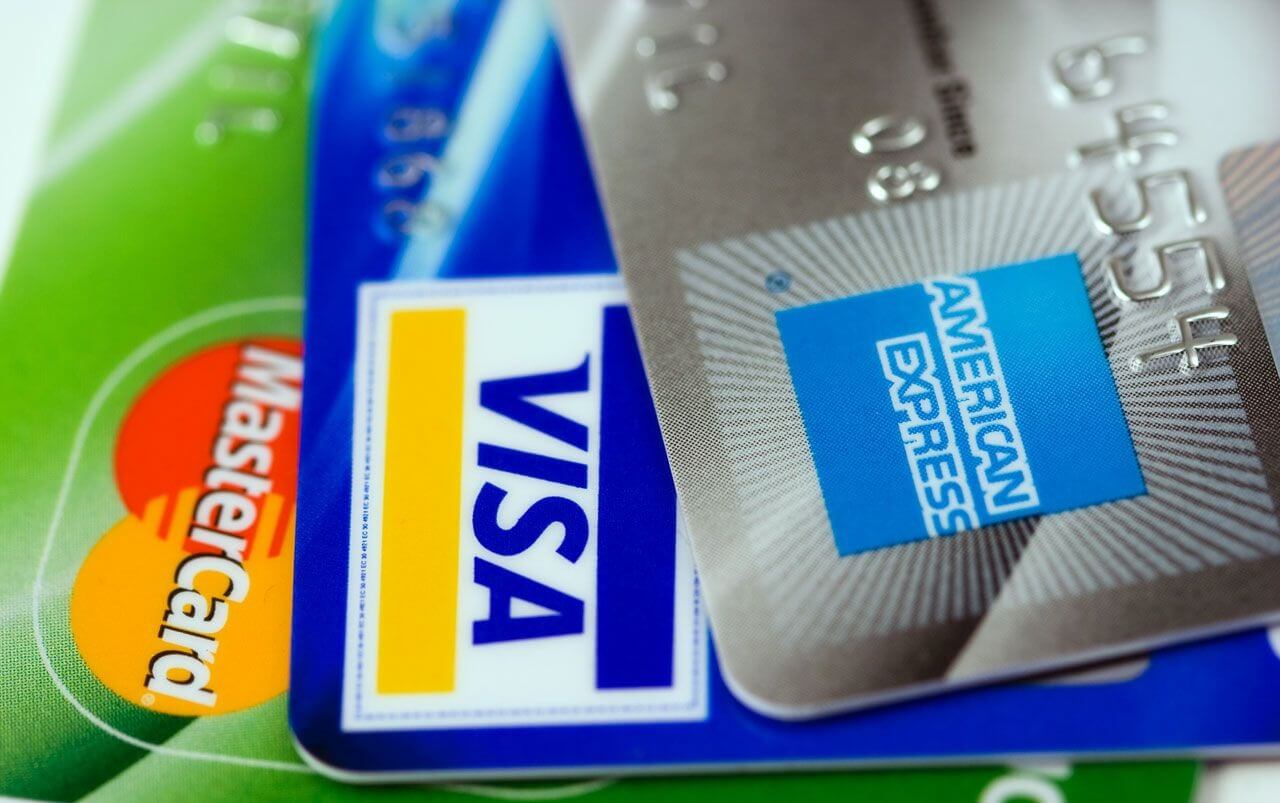 selection of cards showing Mastercard, Visa and American Express