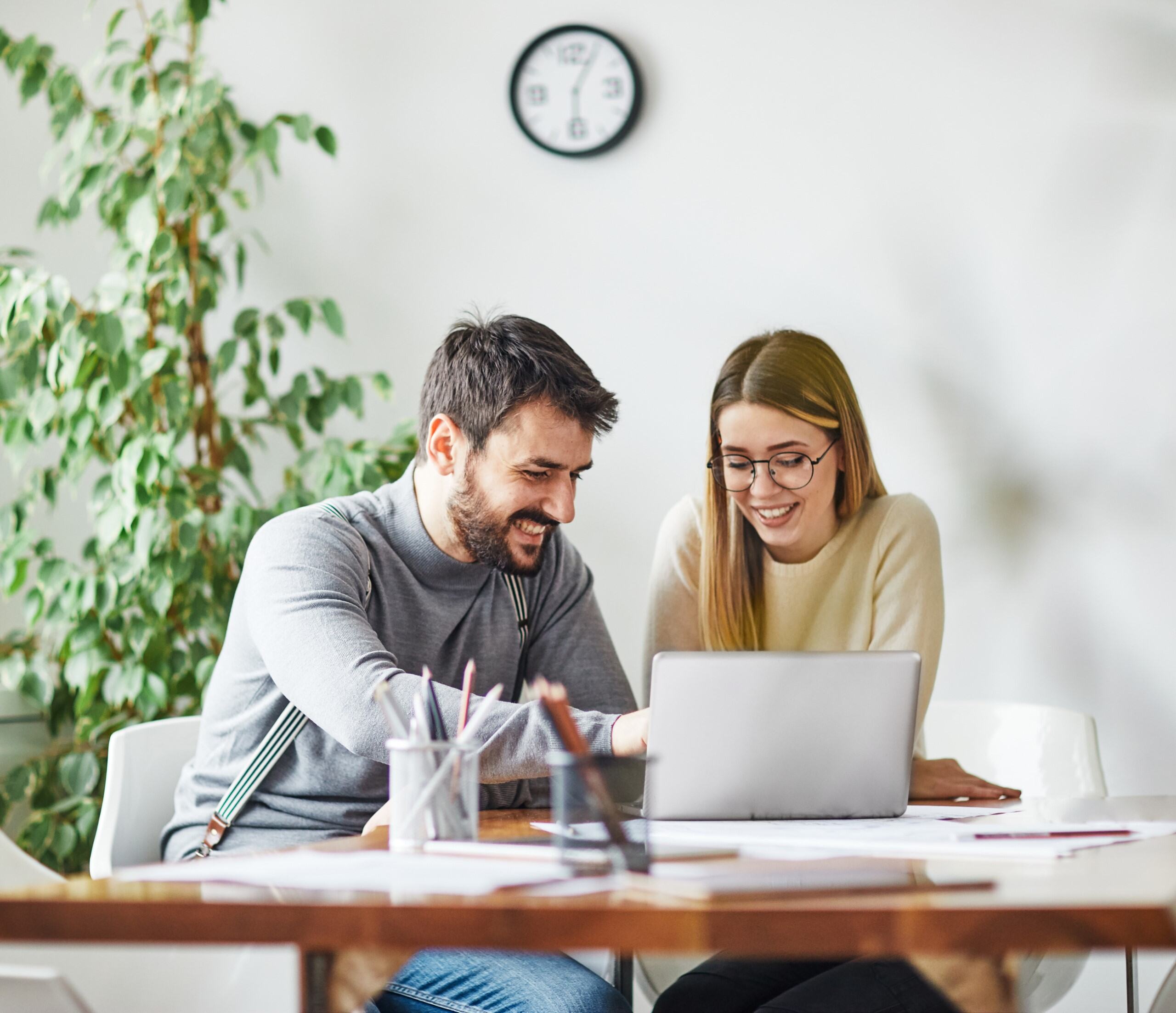 Business owners using laptop
