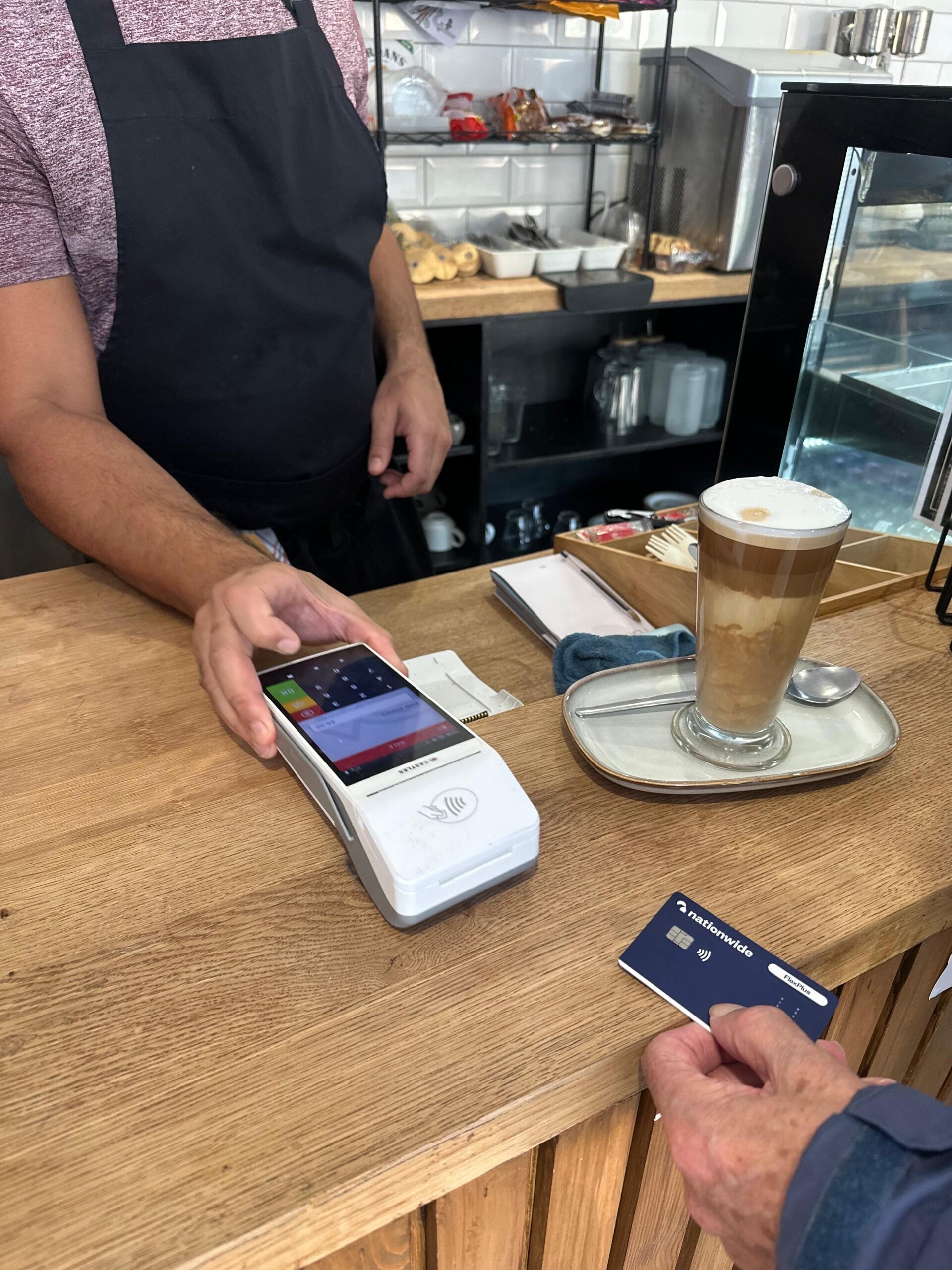 Taking card payment at coffee shop