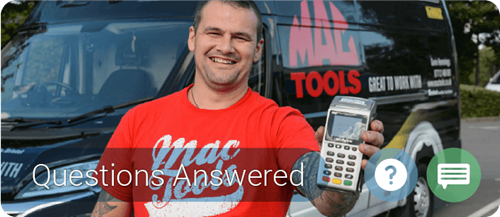 Mac Tools owner holding Handepay Card Payment Machine