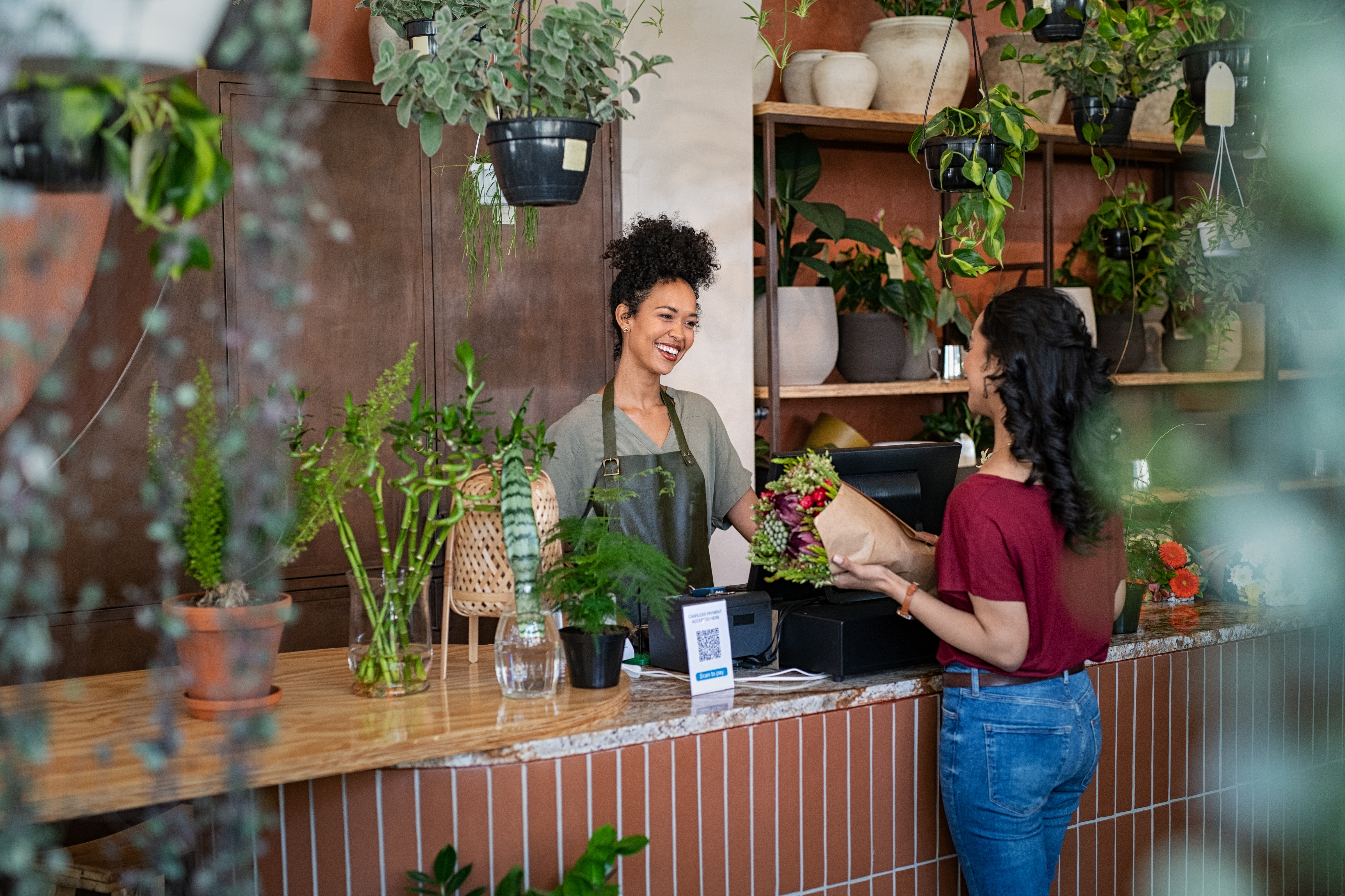 Florist serving a customer