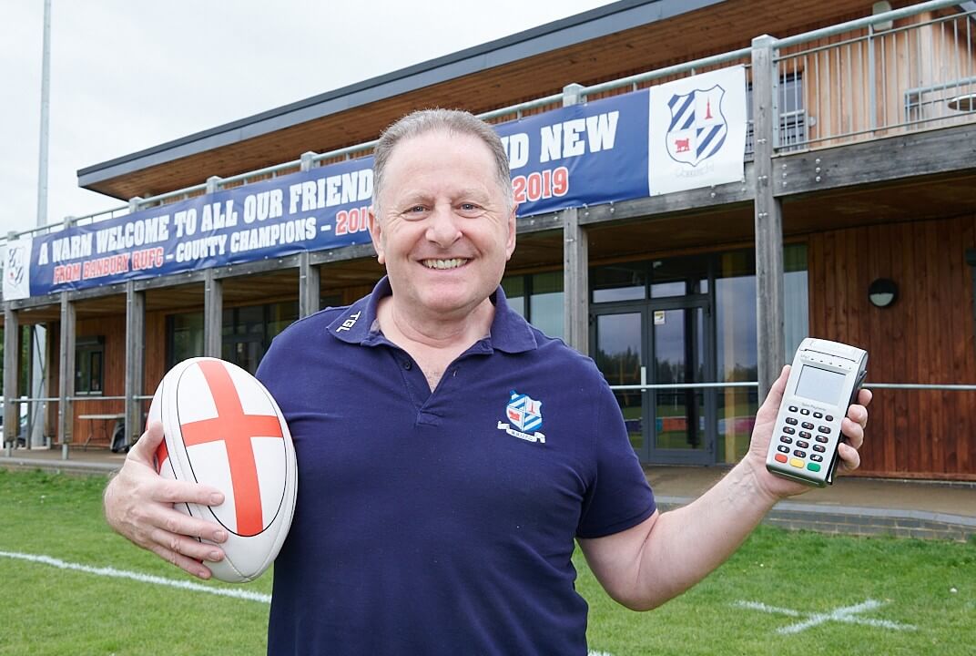 Banbury Rugby Club owner holding Handepay Card Payment Machine